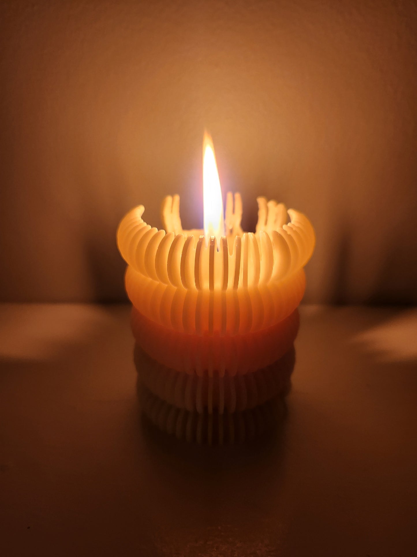 Scalloped beeswax pillar candle