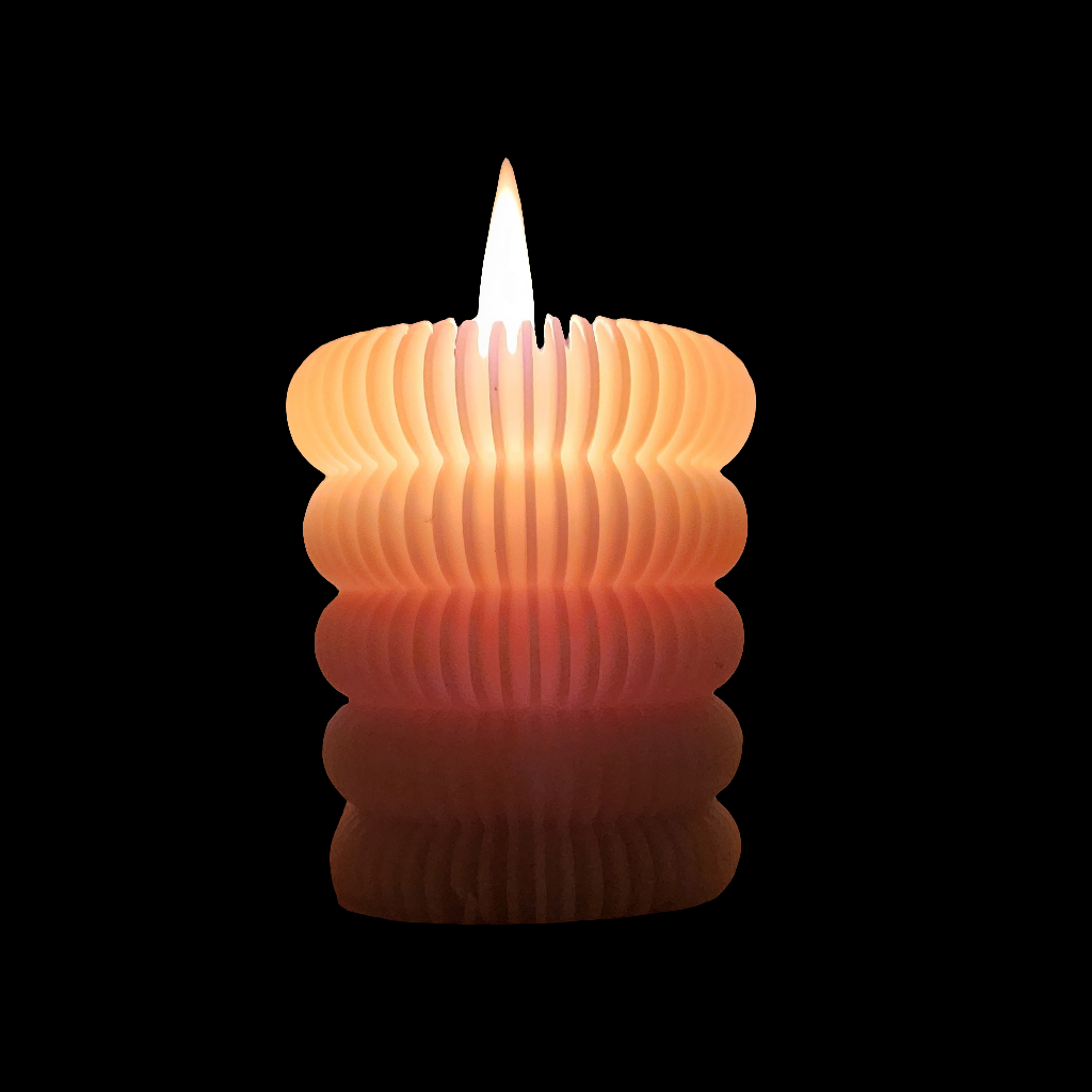 Scalloped beeswax pillar candle