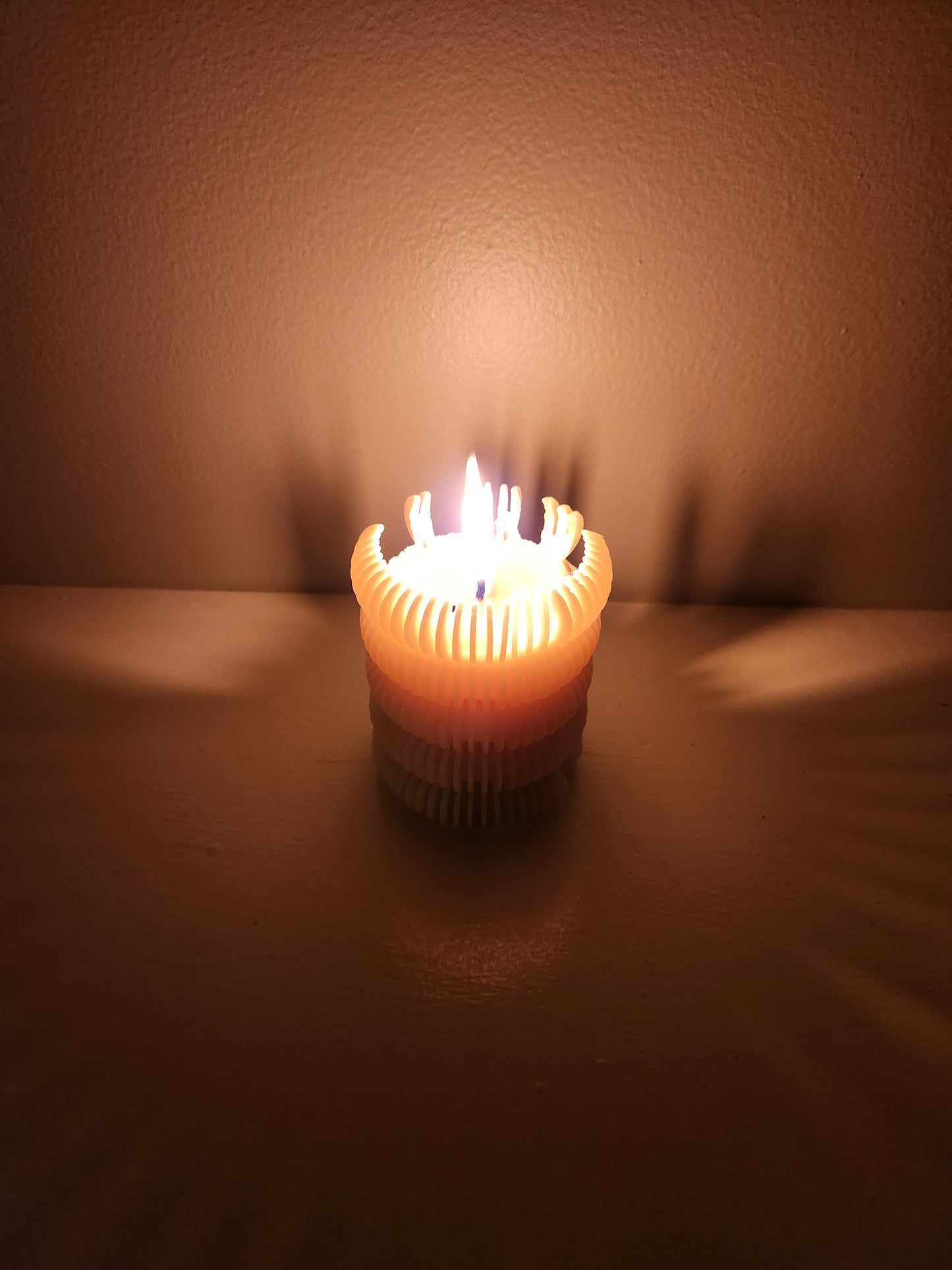 Scalloped beeswax pillar candle