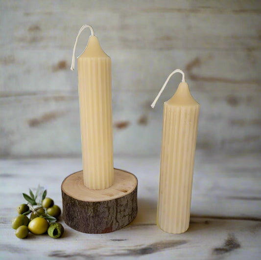 Pair of ribbed short  taper candles 15cm x 3cm